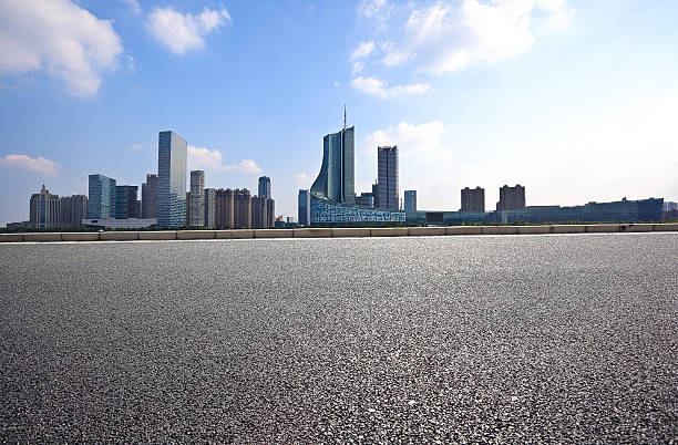 Empty road floor with City building background
