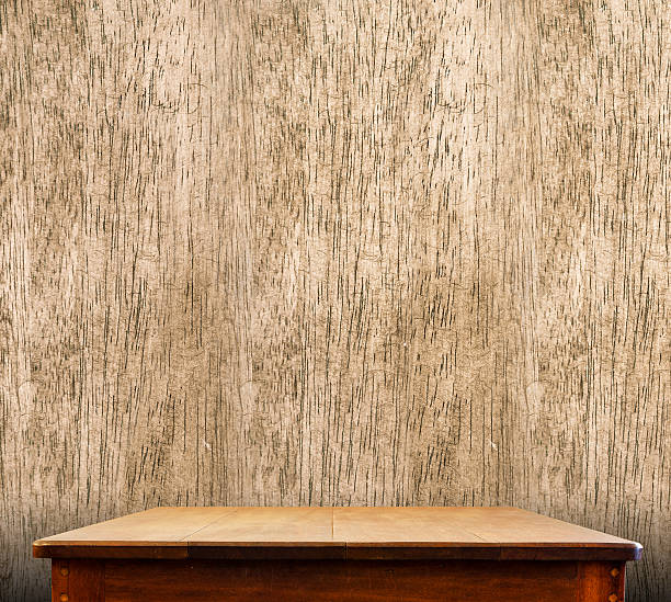 istock wooden tabletop at wood wall 494905172