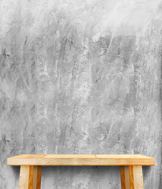 istock wooden tabletop at crack concrete wall 494905288