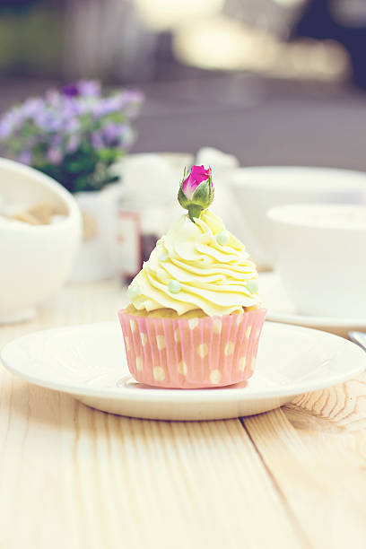 istock Chocolate Cupcake with chocolate frosting on the table 494905312
