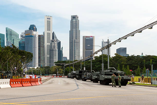 National Day Parade (NDP) at business area in Singapore. Singapore City, Singapore - July 11, 2015: National Day Parade (NDP) Rehearsal to celebrates 50 years of independence at business area ndp stock pictures, royalty-free photos & images