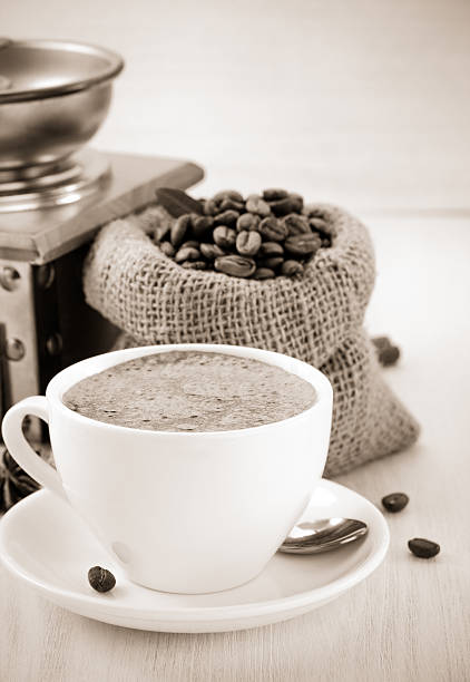 cup of coffee on wooden background