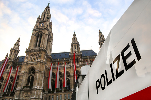 Polizei (Police) sign on a vehicle in front of Vienna Rathaus (City hall)