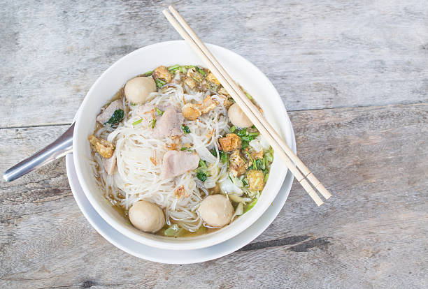 istock Thai noodle soup, on wood background 494915300