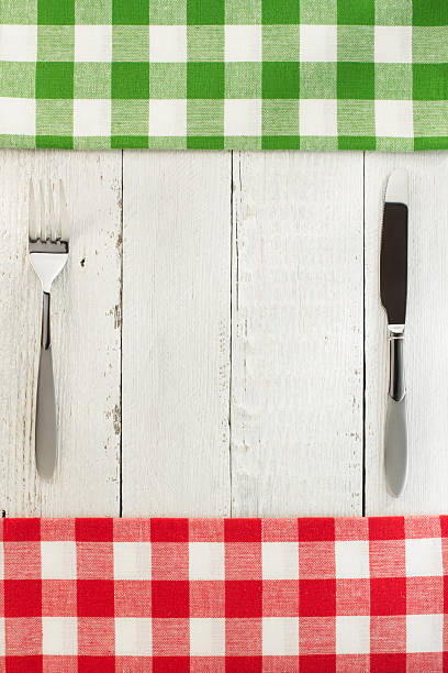 istock cloth napkin and fork with knife on wood 494926628