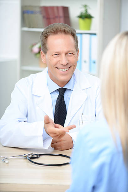 istock Smiling cardiologist talking to the patient 494928668