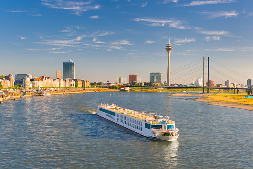 Cityscape of Dusseldorf over the Rhine river in a sunny summer day