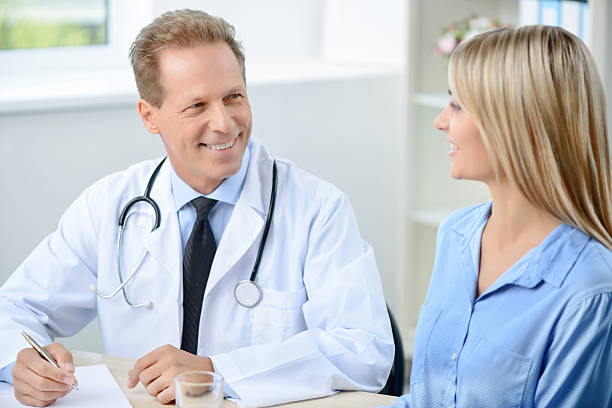 istock Professional doctor examining his patient 494928990