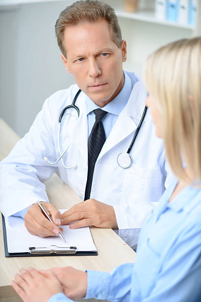 istock Professional doctor examining his patient 494929106