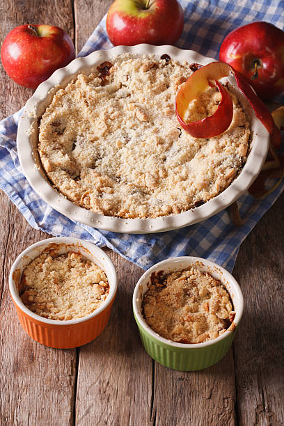 istock Crumble with apples close-up in baking dish. Vertical 494930574