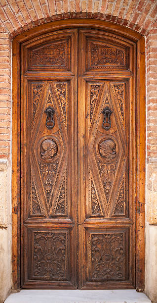 istock Decorated old wooden door 494932343