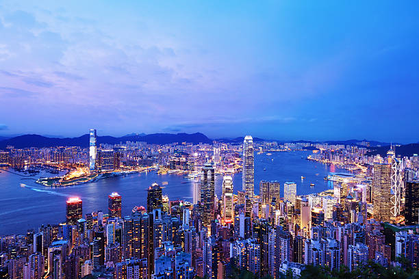 Hong Kong at night http://i.istockimg.com/file_thumbview_approve/25856580/2/stock-photo-25856580-hong-kong-victoria-harbor.jpg international commerce center stock pictures, royalty-free photos & images