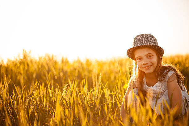 istock Little girl in a wheat 494934965
