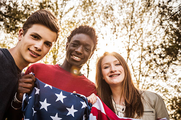 istock Teenagers with USA flag 494935261