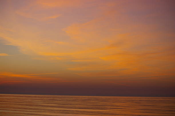 Beautiful orange blue sunset at Baltic sea