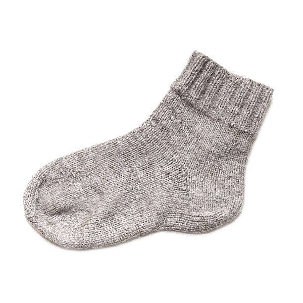 istock Gray woolen sock isolated on white background 494936491