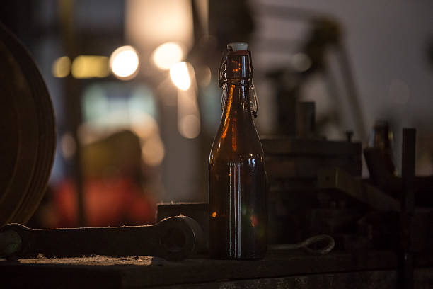 istock plain beer bottle in front of an old factory hall 494937597