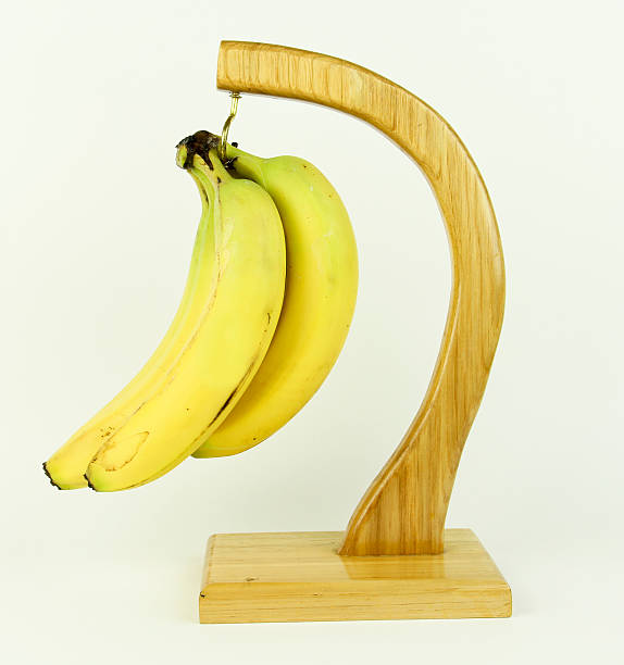 istock Bunch of Bananas on a fruit hook 494938930