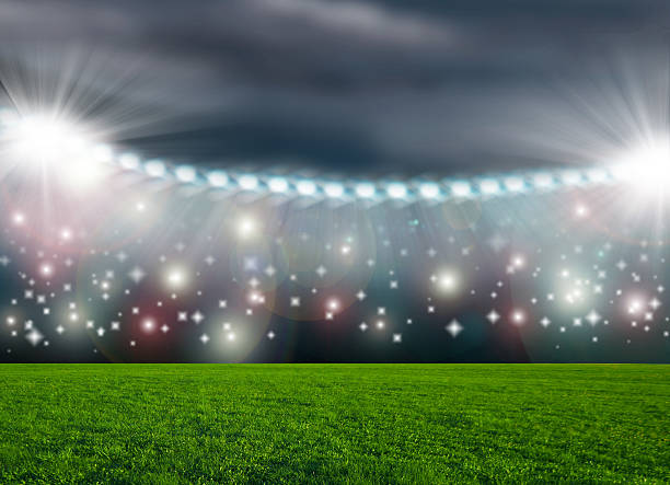 istock Soccer ball on green stadium arena 494939147