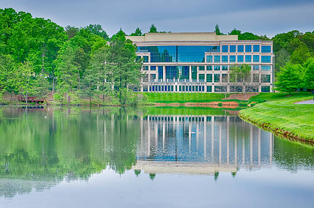 istock office building reflecting in lake 494939567
