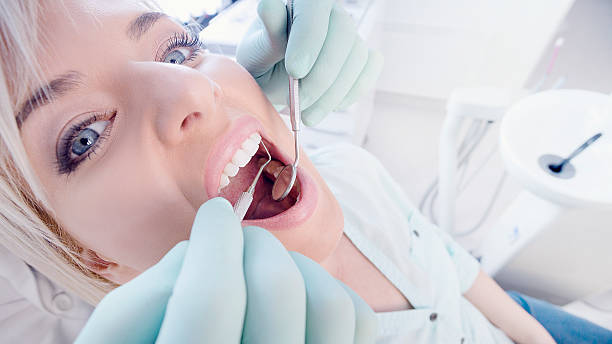 istock Young woman at the dentist 494939660