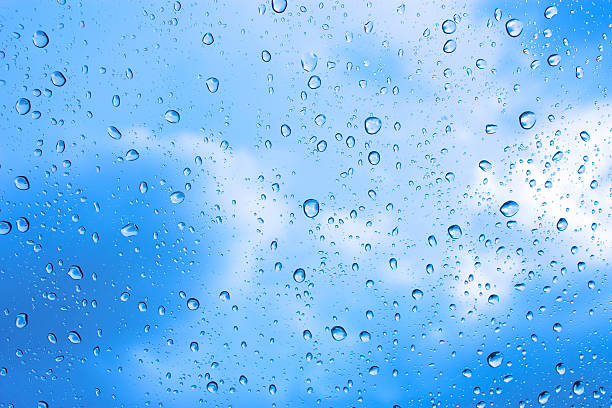 istock Drops of rain on glass , rain drops on clear window 494946476