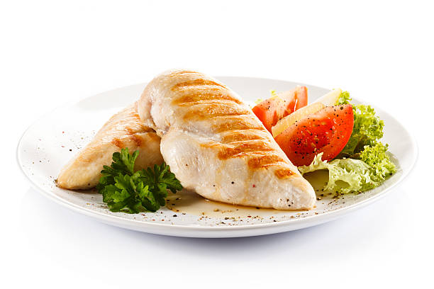 pollo asado filetes largos y verduras - chicken breast fotos fotografías e imágenes de stock