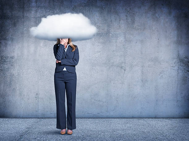 istock Businesswoman With Her Head In A Cloud 494949442