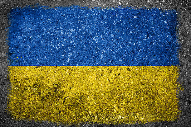 istock Ukrainian Flag Painted on Concrete Wall 494954731