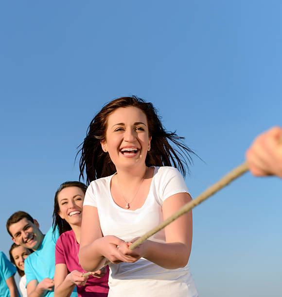 istock funny tug of war 494955253