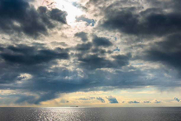 istock dark cumulus clouds hovering over the sea 494955673