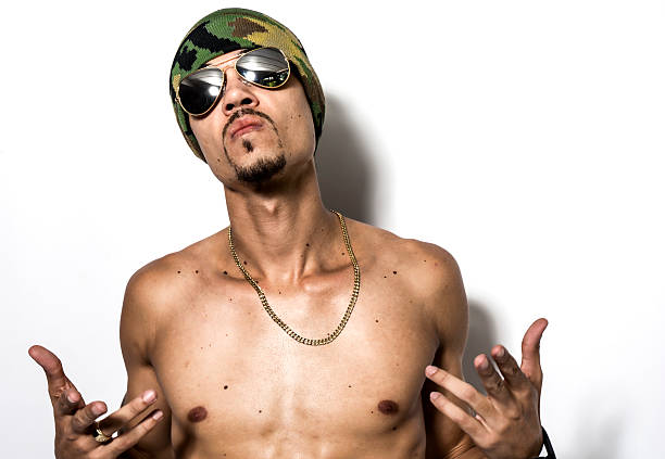 istock Black Male Hip Hop Rapper Attitude Sunglass Pose Against White 494955765