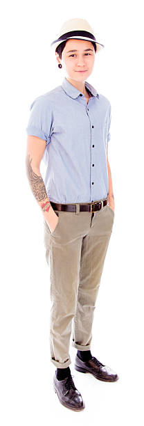 istock Young woman standing with her hands in pockets 494957001