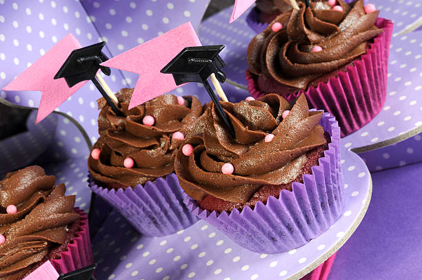 istock Graduation day pink and purple party cupcakes 494959803