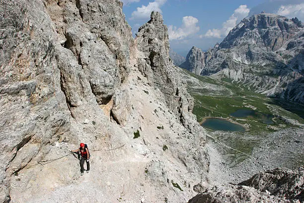 Photo of woman on via ferrata to the peak Paternkofel, sextener dolomites