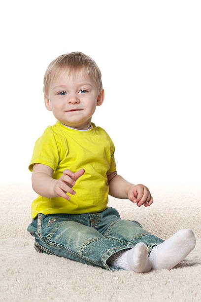 istock Smiling baby boy on the carpet 494960874