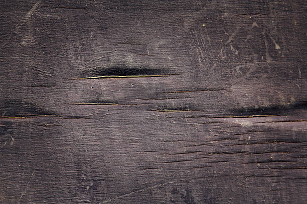 istock Background wood parquet axle swollen water wet with cracks 494961684
