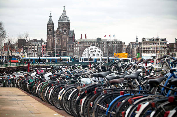 Bicycles along the canals of Amsterdam, Netherlands stock photo