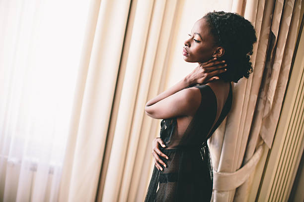 istock Young black woman in the room 494974488