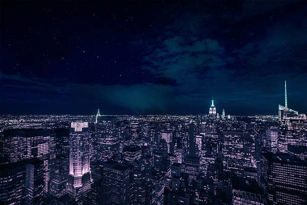 манхэттен в ночь - manhattan aerial view new york city city стоковые фото и изображения