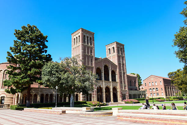 Royce Hall at the University of California, Los Angeles (UCLA) Los Angeles, California, USA - July 9. 2015: A group of studens walk past Royce Hall at the Univrsity of California, Los Angeles (UCLA) campus. ucla photos stock pictures, royalty-free photos & images