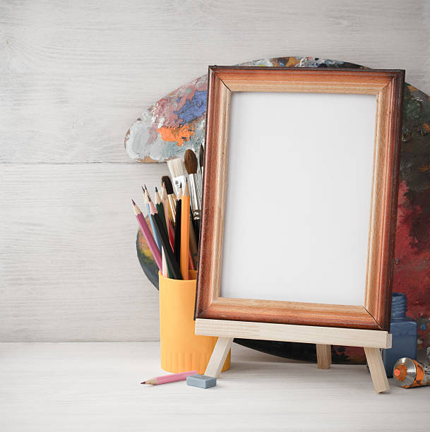 istock picture frame and paints on wood 494977410