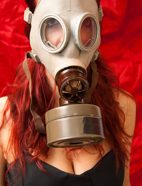 istock Sexy Woman with gas mask 494978098