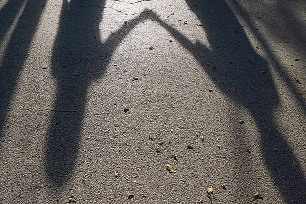 istock Shadow of woman hold hands 494979134