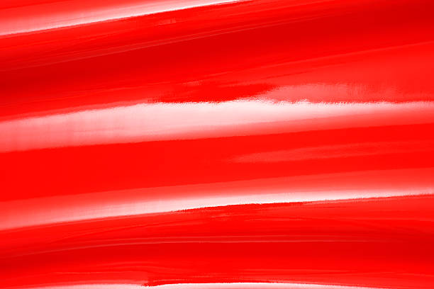istock Close-up of red shiny vinyl wave texture background 494980155