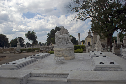 Havana, Cuba - January 28, 2014: Cristobal Colon Cemetery in Havana is a free outdoor exhibition of arts. Most of the tombs are carved carefully, some of them are real masterpieces. Prominent people of Cuban history are buried here.