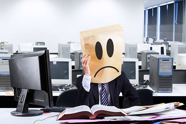 istock Exhausted businessman with cardboard head 494981731