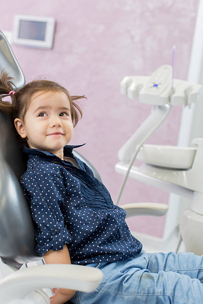 istock Little girl at dentist 494983179