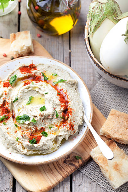 istock Traditional arabian eggplant dip baba ganoush with herbs, smoked paprika 494992168