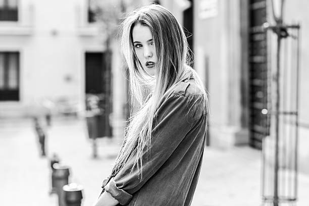 istock Blonde girl urban background 494992766